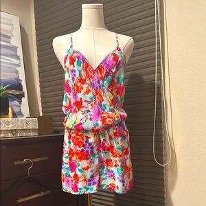 Woman's Newbury Kustom Floral Romper w/crossover design and racer back. Size Sm